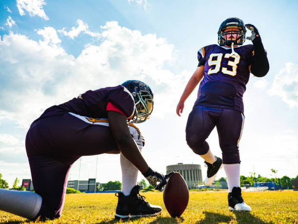 istock Junior Football players during game 1255245073