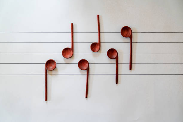 istock music notes made from wood. Hand made spoon 1255245151