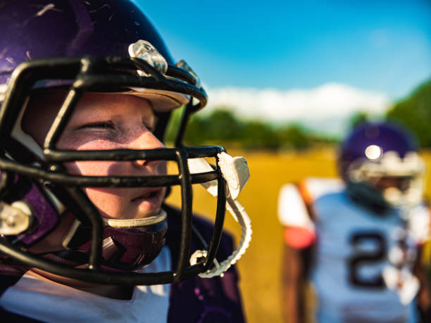 istock Junior Football players during game 1255245331