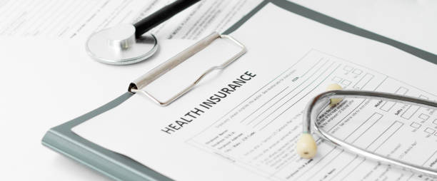 istock Health insurance form with stethoscope concept for life planning 1255246638