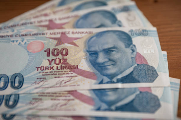Bunch of 100 Turkish Currency Lira Banknotes Bunch of 100 Turkish Currency Lira Banknotes central bank stock pictures, royalty-free photos & images