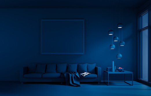 Loft room interior with sofa in year 2020 classic blue color