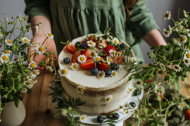 istock On the table is a cake decorated with flowers and berries 1255260304