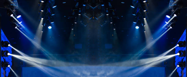 istock Abstract texture background for design. Stage light and smoke on stage, lighting and spotlights. 1255261254