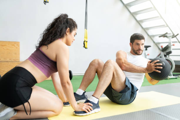 istock Sporty Latin Couple Doing Workout Together 1255263960
