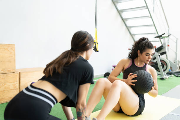 istock Sporty Latin Friends Doing Workout Together 1255263973
