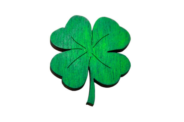 istock Green leaf of clover from a tree is isolated on a white background. 1255265351