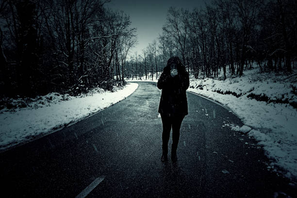 istock Snowy forest woman 1255267079