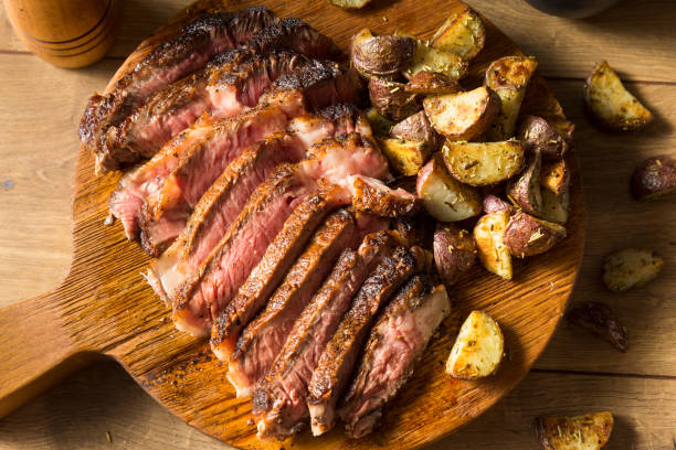 istock Grass Fed Ribeye Steak and Potatoes 1255267265