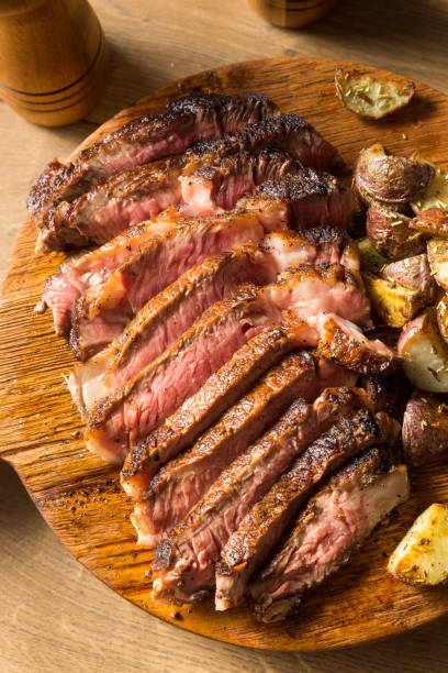 istock Grass Fed Ribeye Steak and Potatoes 1255267588