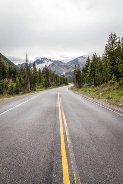 istock Two Lane Road in Mountains 1255270701