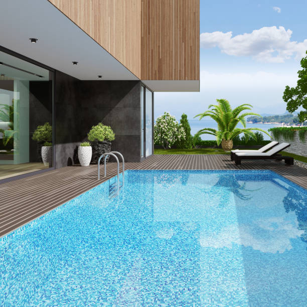 istock Luxurious ocean side villa with swimming pool at summer daylight scene 1255273969