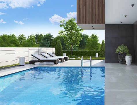 Luxurious villa with outside swimming pool at summer scene.\nBig blue swimming pool near living room and kitchen. \nStylish and comfortable sun area with a modern brown sunbeds. \nDark gray accent slate stone walls with natural plants.\nNatural floor tiles. Ceiling with white spotlights.\n\n+++ background is my photo.