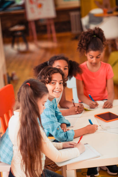istock A boy in teamwork is smiling at the camera 1255285157