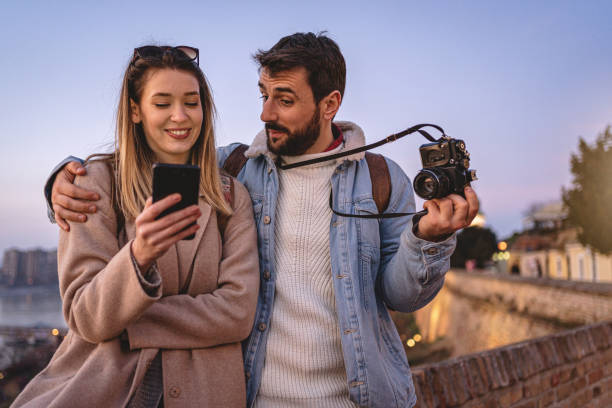 istock Beautiful cute couple having fun traveling together 1255287262