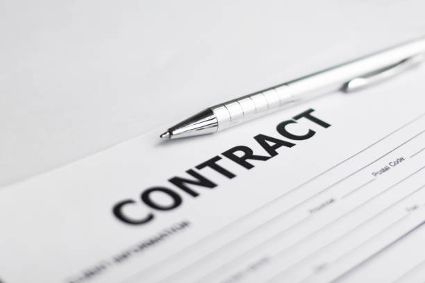 istock Business Contract and pen close up 1255291789
