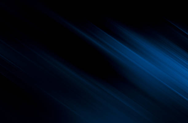 istock abstract blue and black are light pattern with the gradient is the with floor wall metal texture soft tech diagonal background black dark clean modern. 1255291835