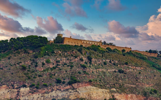 istock Fortress on Barcelona Mountain at Dusk 1255294218