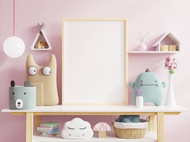 istock Mock up posters in child room interior, posters on empty pink wall background. 1255294838