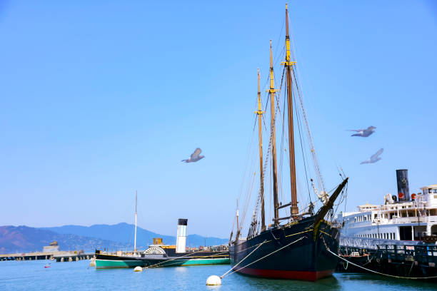 San Francisco, California, USA - November 30, 2013: These boats colorful fishing boats moored at Fisherman's Wharf in San Francisco and on this beautiful day they looked great and ready for fishing.