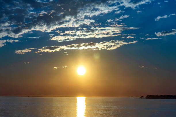 istock colorful sunset over the beach in Pensacola, Florida 1255295803