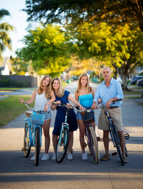 istock Miami suburb family on bikes 1255302072