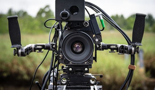 A prime lens is affixed to a digital cinema camera.