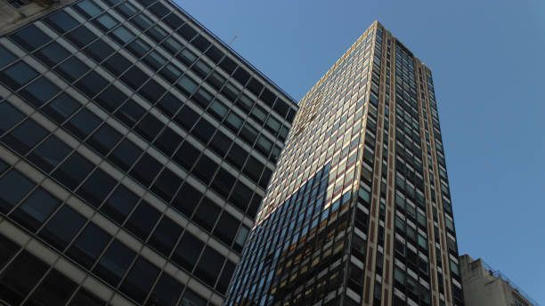 istock International Style tower on a Downtown District from a low angle view 1255304418