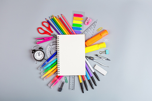Back to School background with place for text. Collection of school supplies in a bright flat style. Educational concept. Copy space, mockup, template