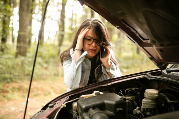 istock asian Woman is calling emergency service 1255309754