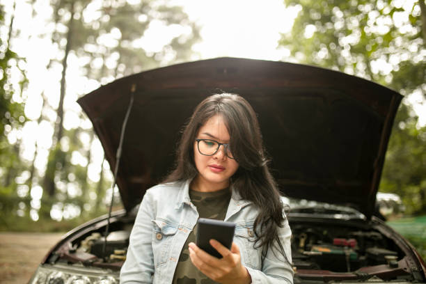 istock asian Woman is calling emergency service 1255309839