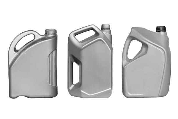 istock Plastic motor oil canisters isolated on white 1255327669