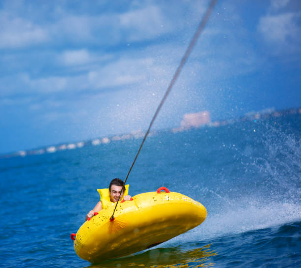 istock Almost flying on a yellow inflatable tube Miami 1255328373