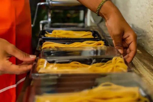 a young black woman at her handmade food company