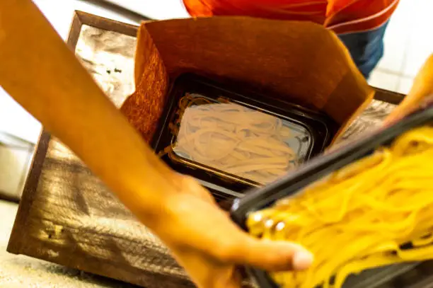 a young black woman at her handmade food company