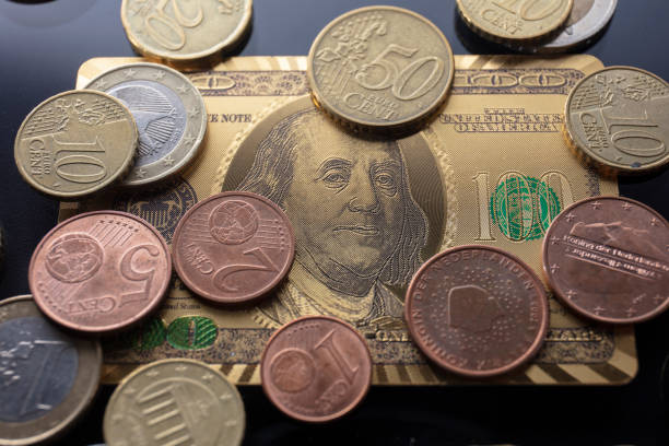 Golden dollar and EURO coins