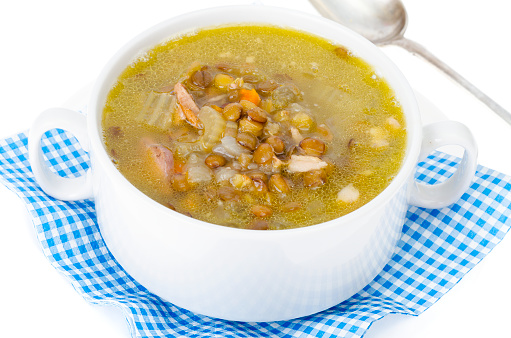Tasty hot soup with lentils and celery. Studio Photo