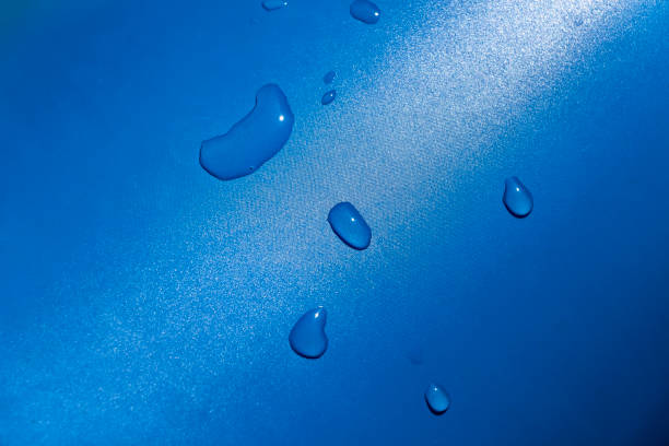 istock Drops of water on the surface 1255338127