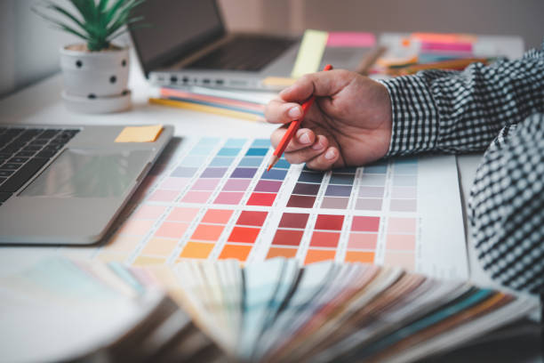 istock The graphic designer creative team is currently working on the design and color selection on the guide color for advertising design. 1255343288