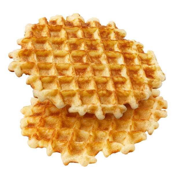 istock Close-up of two delicious waffles on white 1255344414