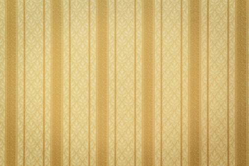 Oro con un patrón floral papel tapiz rayado photo