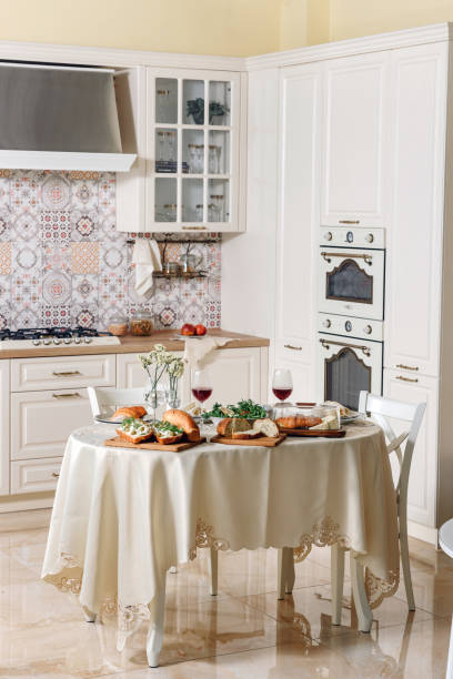 istock Dining table with food is in the kitchen. 1255349442