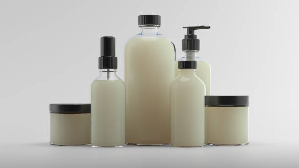 istock Cosmetic bottle 3d background. Set of body care flasks with abstract liquid on white reflective background. 1255350983