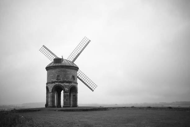 Windmill on a countryside hill A British Windmill on a countryside hill in overcast conditions chesterton photos stock pictures, royalty-free photos & images