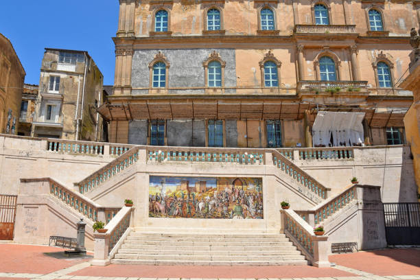 On the staircase of Saint Mary a ceramic mural painting, dating from the seventeenth century, reproducing a historic battle in Caltagirone, an ancient city in Sicily.