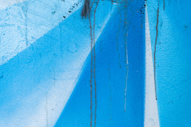 istock Part of a multi-colored painted wall, close up texture 1255356773