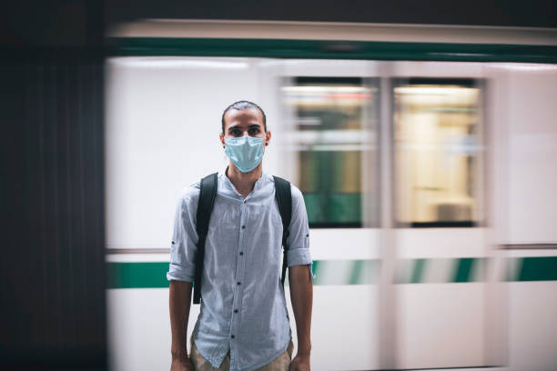 istock Portrait Of Young Man With Protective Face Mask. 1255358603