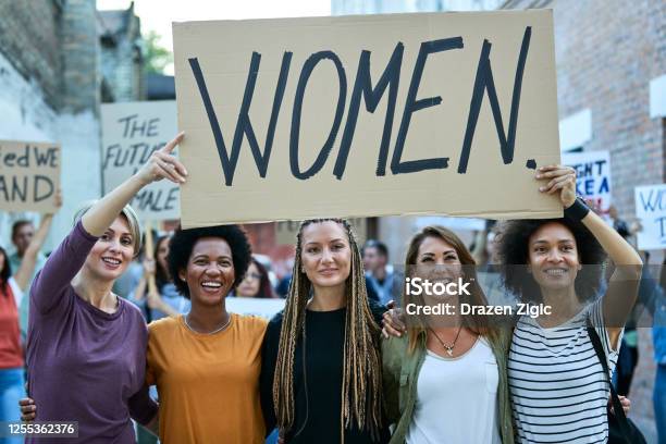 Happy United Women Protesting For Their Rights On Street Demonstrations Stock Photo - Download Image Now