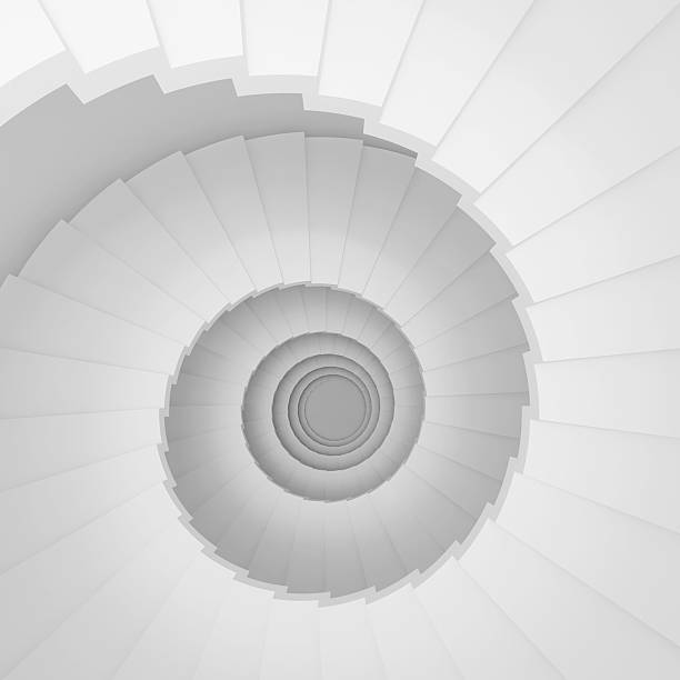 istock Overhead digital image of a long white spiral staircase 125536529