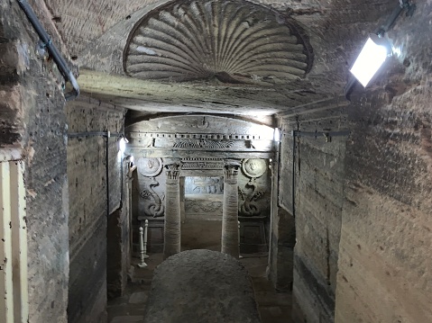 The catacombs of Kom El Shoqafa meaning `Mound of Shards` is a historical archaeological site located in Alexandria, Egypt, and is considered one of the Seven Wonders of the Middle Ages